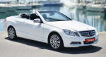 A cabrio may not be perfect if you have had your hair done for your wedding,  but the groom might like it