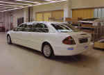 A white Mercedes limosine for a classy arrival for the parents, the groom or the modern bride