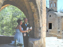 The doves are in hand - The bride and groom are about to release them