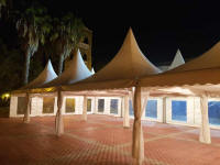Linked canopies may create a larger reception space