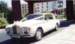 A classic 1974 white wedding rolls royce with decoration - A Roller is always a roller